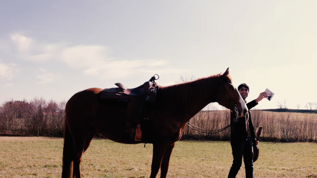 WATCH: “never ever have I thought that I’d be finding myself playing the mandolin on horse back for the camera” – Alon Sariel.
